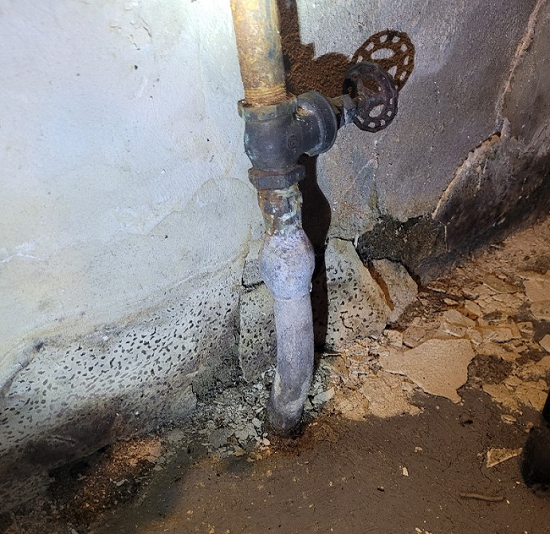Lead pipe in a basement