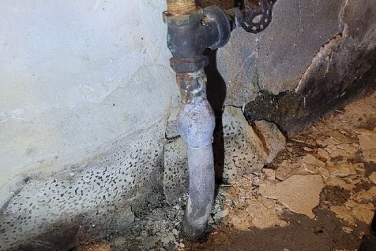 Lead pipe in a basement